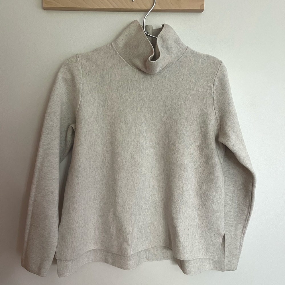 COS minimalist light grey sweater with side slits
